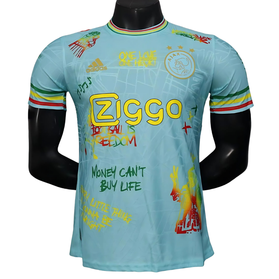Camiseta Ajax 25/26 Edición Especial Bob Marley Celeste