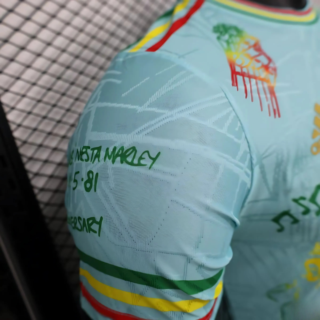 Camiseta Ajax 25/26 Edición Especial Bob Marley Celeste