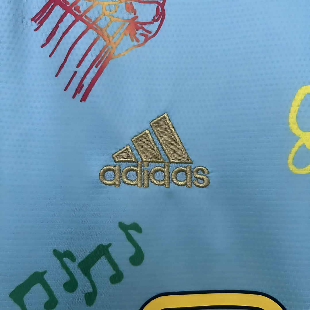 Camiseta Ajax 25/26 Edición Especial Bob Marley Celeste