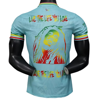 Camiseta Ajax 25/26 Edición Especial Bob Marley Celeste