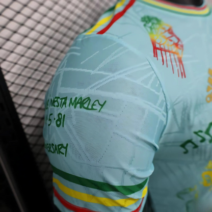 Camiseta Ajax 25/26 Edición Especial Bob Marley Celeste